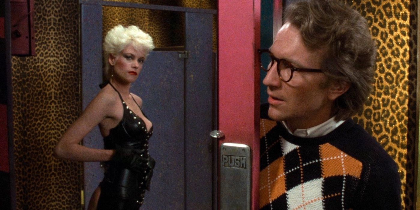 Craig Wasson &amp; Melanie Griffith look at each other in Body Double.