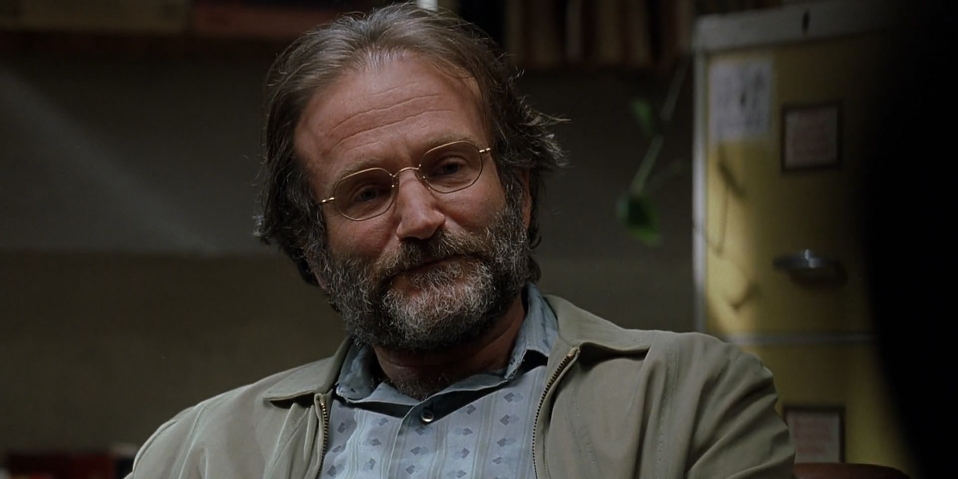 Robin Williams as Sean looking sad in Good Will Hunting.