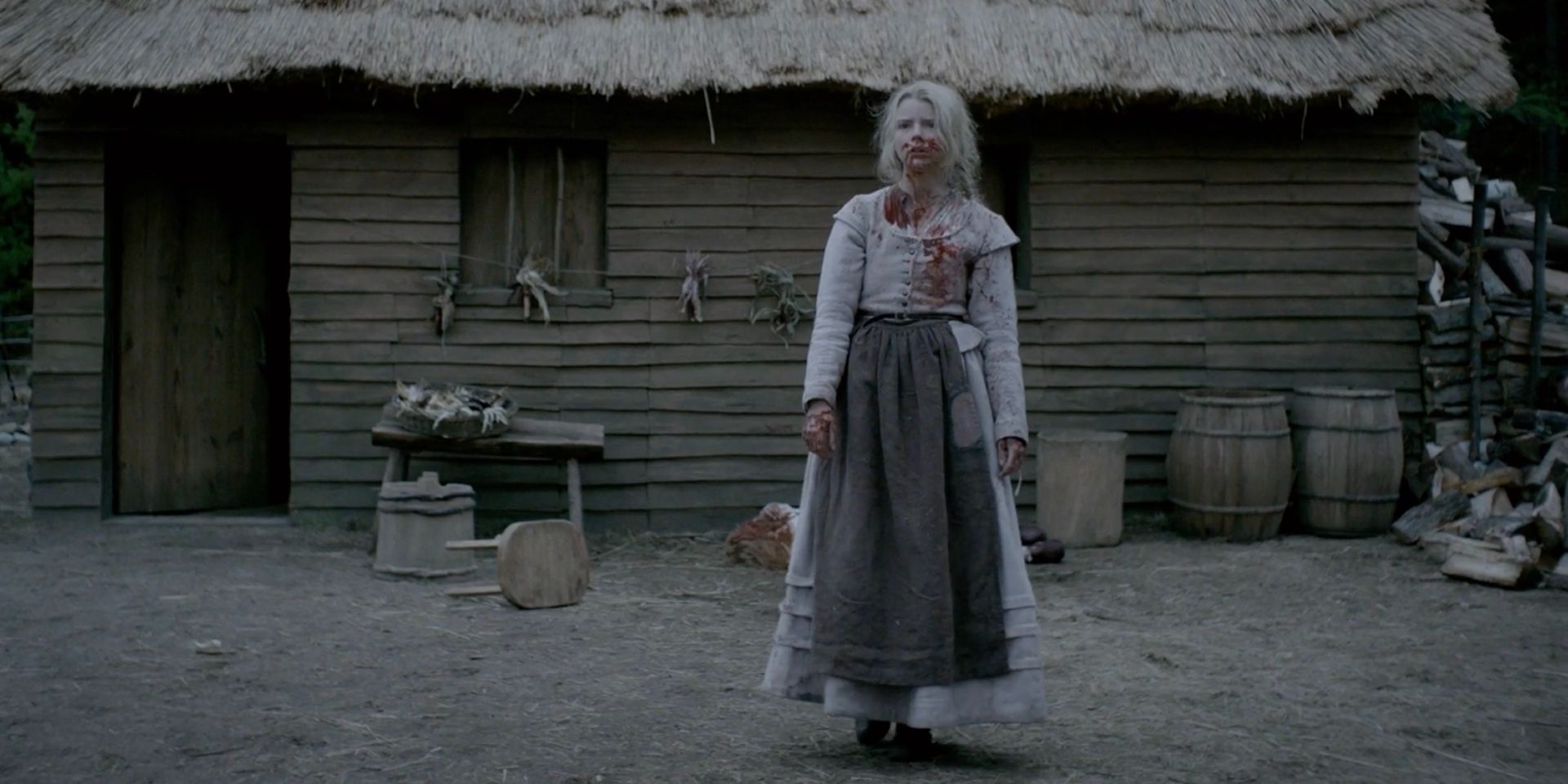 Anya Taylor-Joy's Thomasin covered in blood in The Witch.