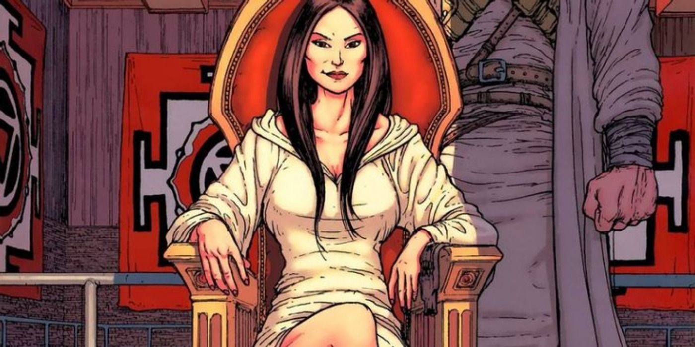 Talia al Ghul sitting on a throne.