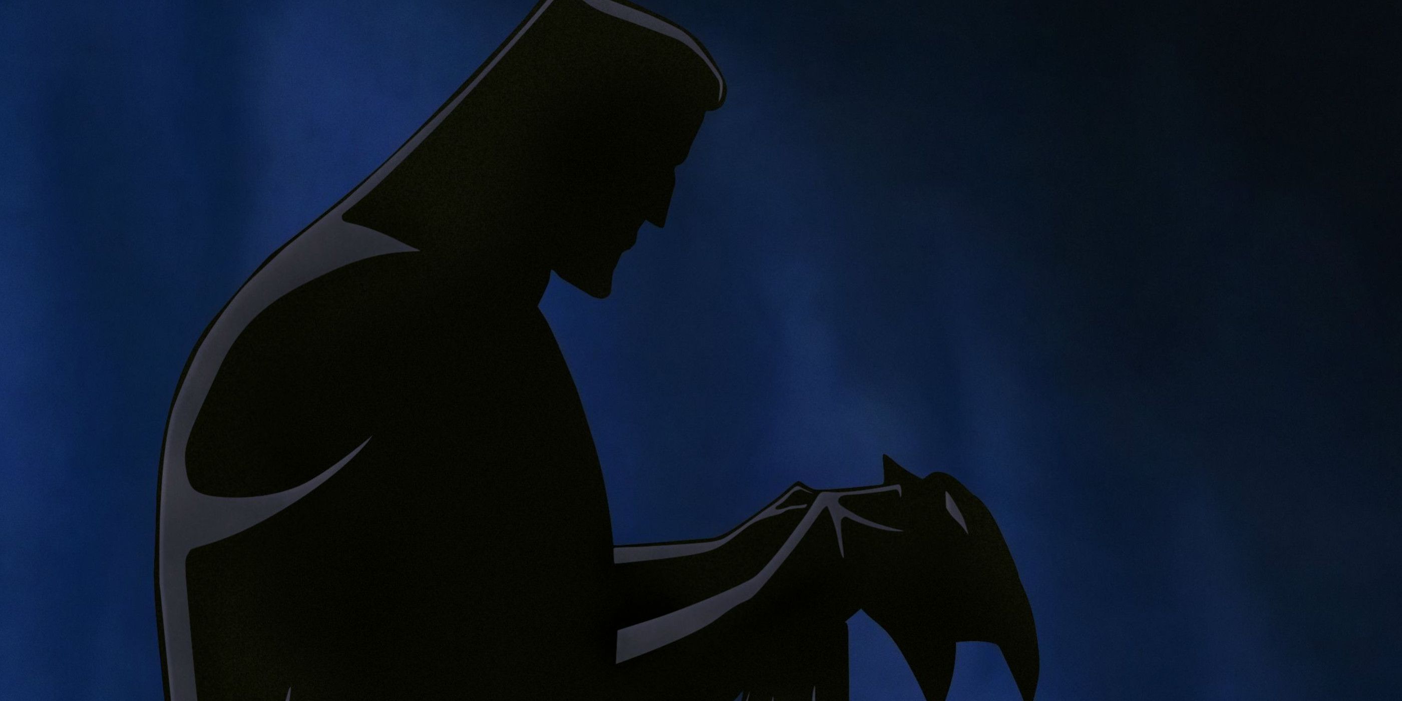 Batman looking at his mask in Mask of the Phantasm.