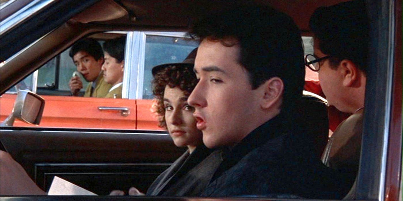 John Cusack looks on while driving his car from Better Off Dead 