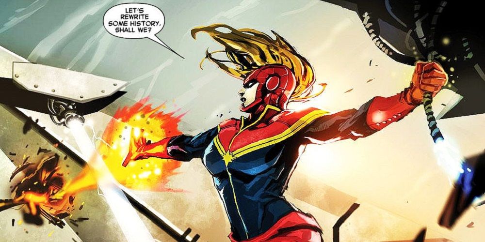 Captain Marvel flying and firing a beam from her hand in Marvel Comics