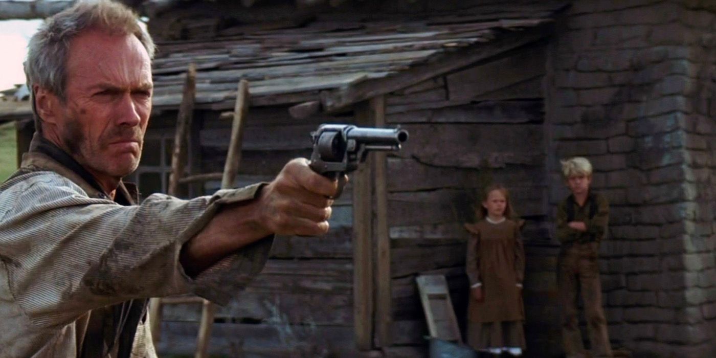 Clint Eastwood as William Munny holding a revolver in Unforgiven
