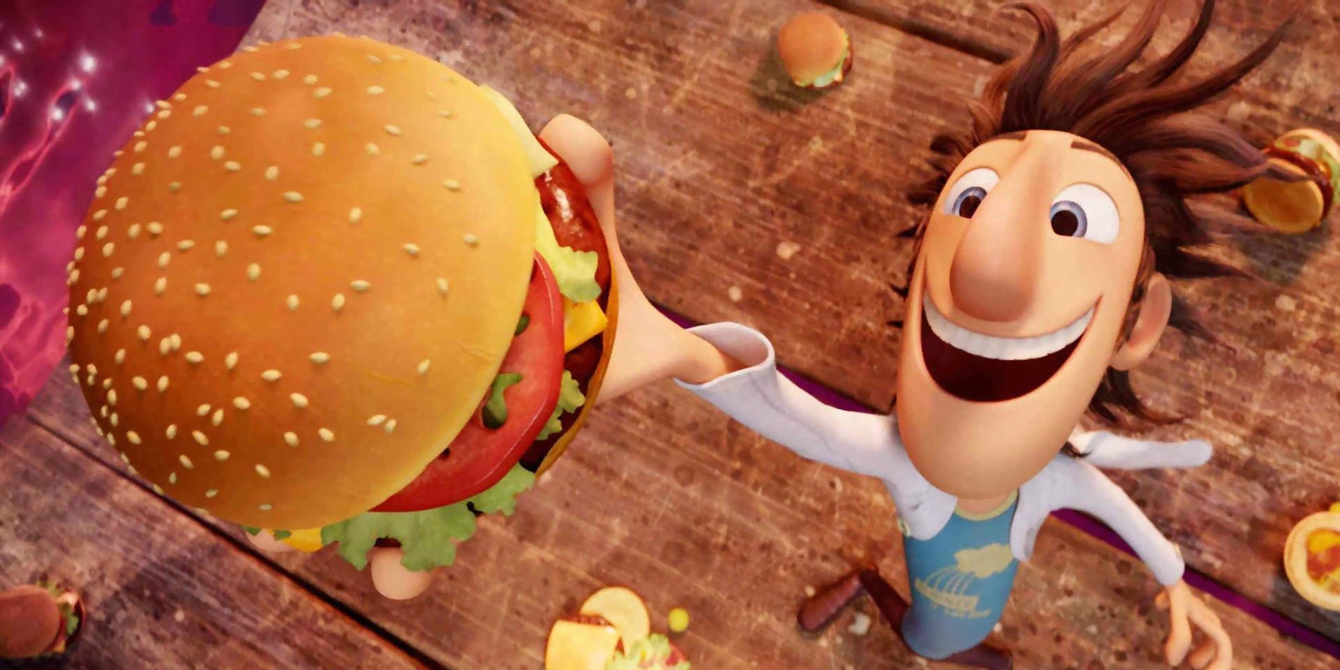 Flint smiling with a hamburger in his hand in Cloudy with a Chance of Meatballs