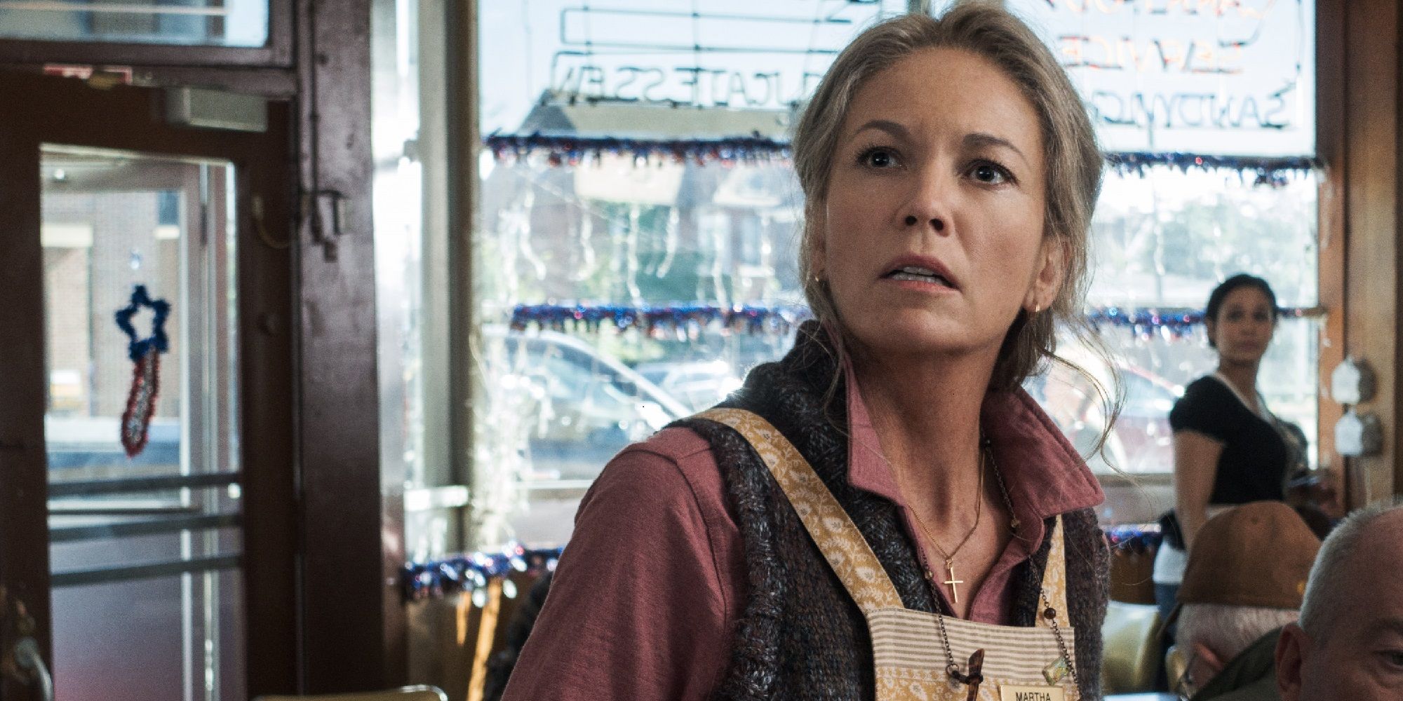 Martha Kent looking up with a surprised expression in Batman v Superman: Dawn of Justice