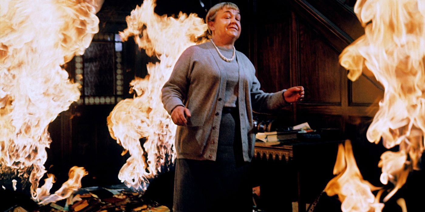 A woman looking euphoric in a fire in Fahrenheit 451