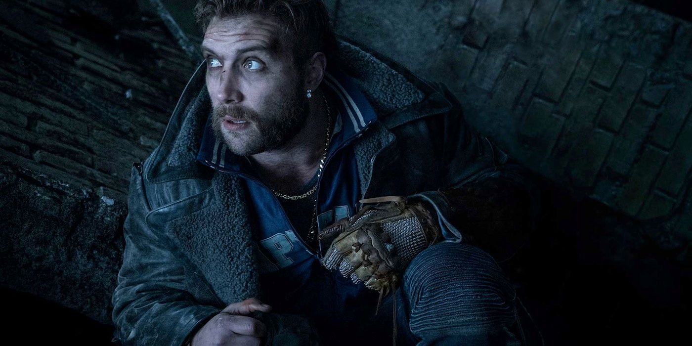 Captain Boomerang crouching on the ground in Suicide Squad