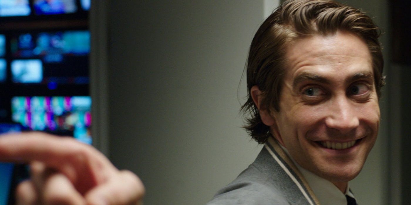 Lou Bloom pointing and smiling in Nightcrawler