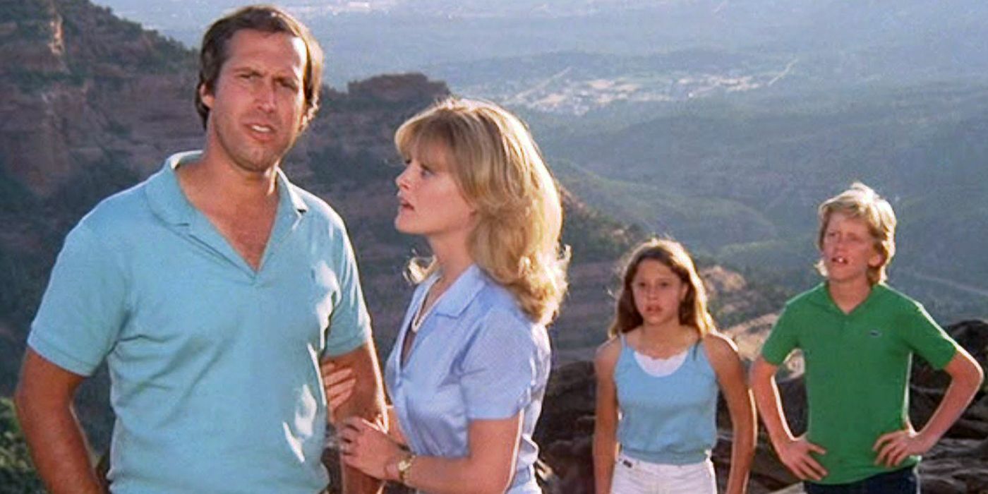 Clark (Chevy Chase) and Ellen (Beverly D'Angelo) standing by a canyon in National Lampoon's Vacation