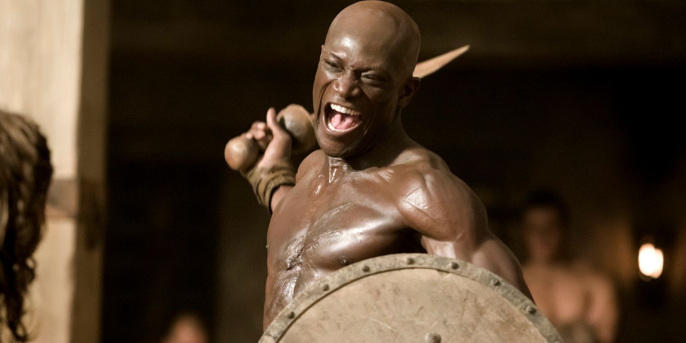 Peter Mensah with a sword and shield in Spartacus