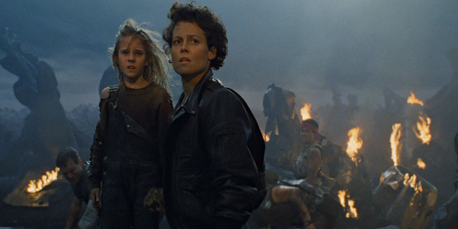 Sigourney Weaver as Ripley and Newt in Aliens