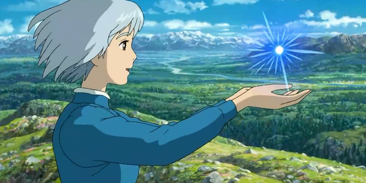 Sophie holds out her hands to Calcifer in Howl's Moving Castle