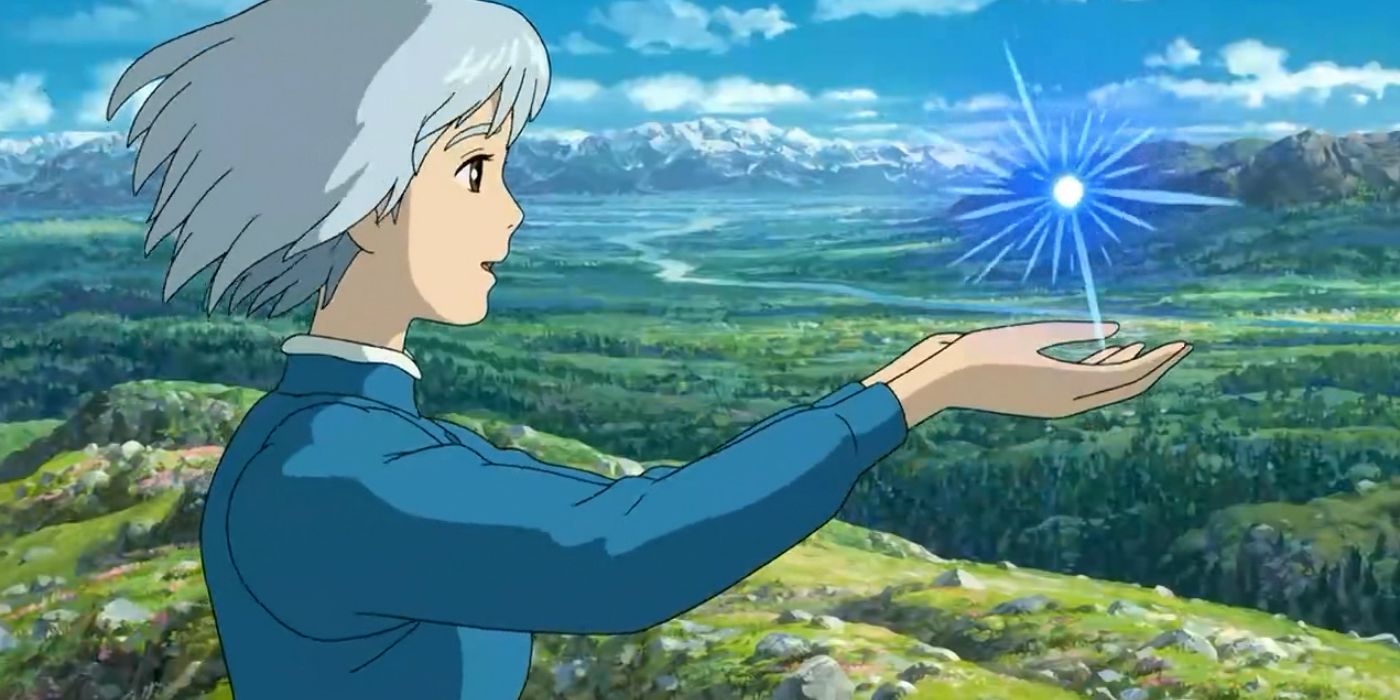 Sophie estende as mãos para Calcifer em Howl's Moving Castle