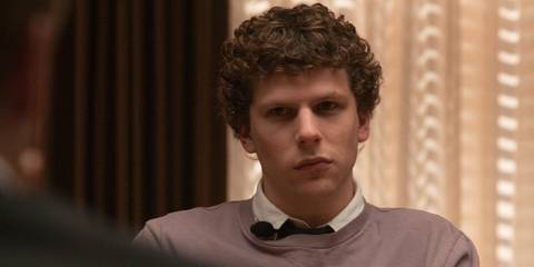 Jesse Eisenberg looking serious as Mark Zuckerberg in The Social Network.
