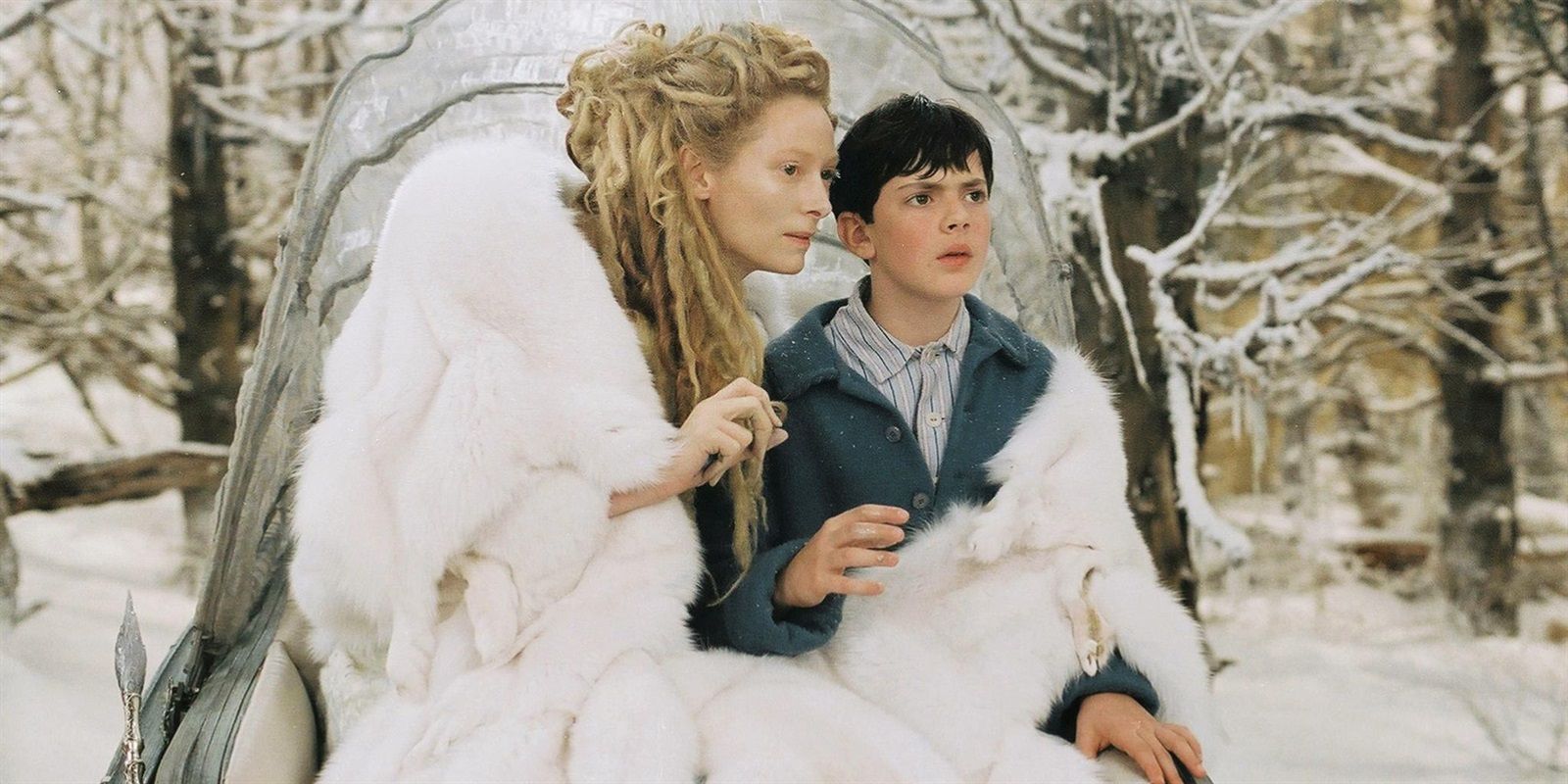 Tilda Swinton as the White Witch and Skandar Keynes as Edmund in The Lion The Witch and the Wardrobe