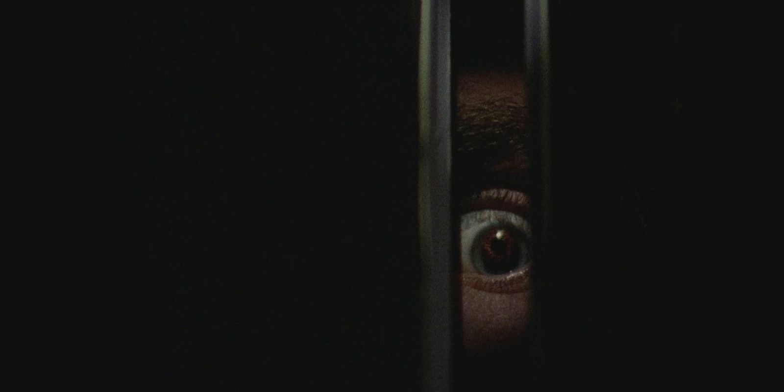 billy peeping his eye in black christmas 1974