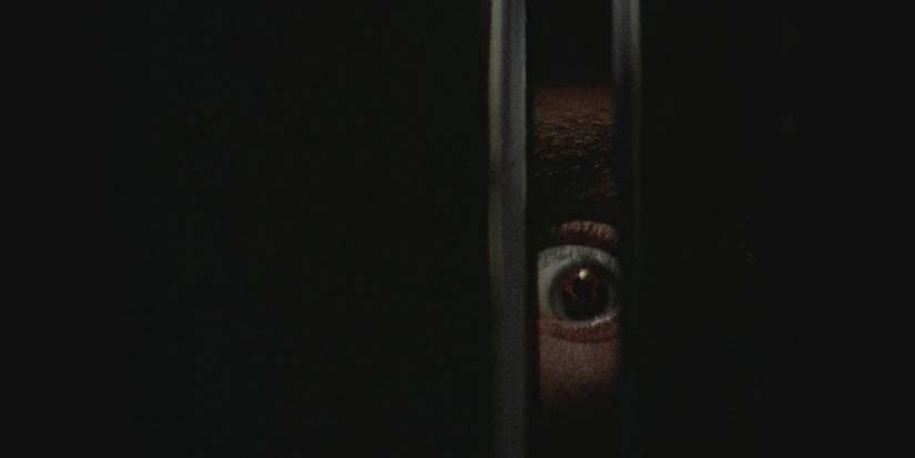 Billy peeping his eye in Black Christmas.