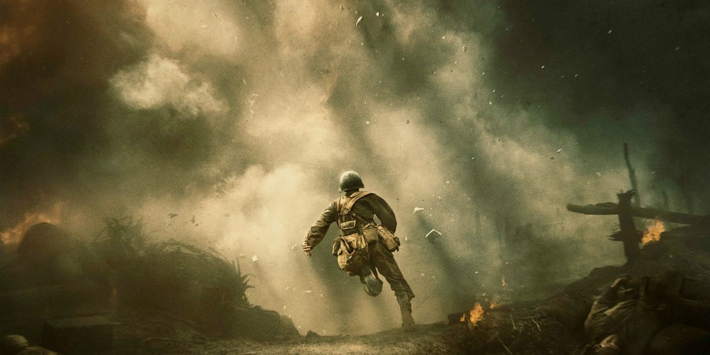 Poster for Hacksaw Ridge (2016). Andrew Garfield's Desmond Doss runs into the Battle of Okinawa as debris is kicked up by artillery.