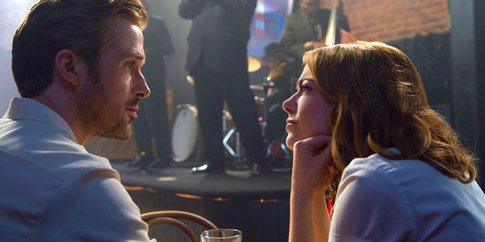 Emma Stone gazes at Ryan Gosling longingly the way we all would in La La Land.