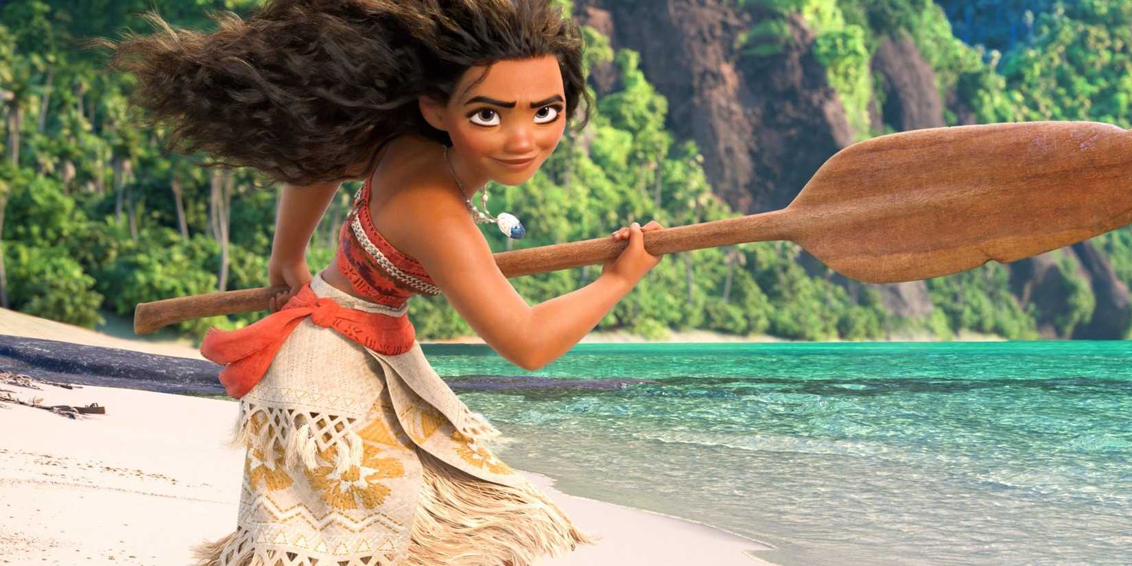 Moana brandishes her oar on the beach
