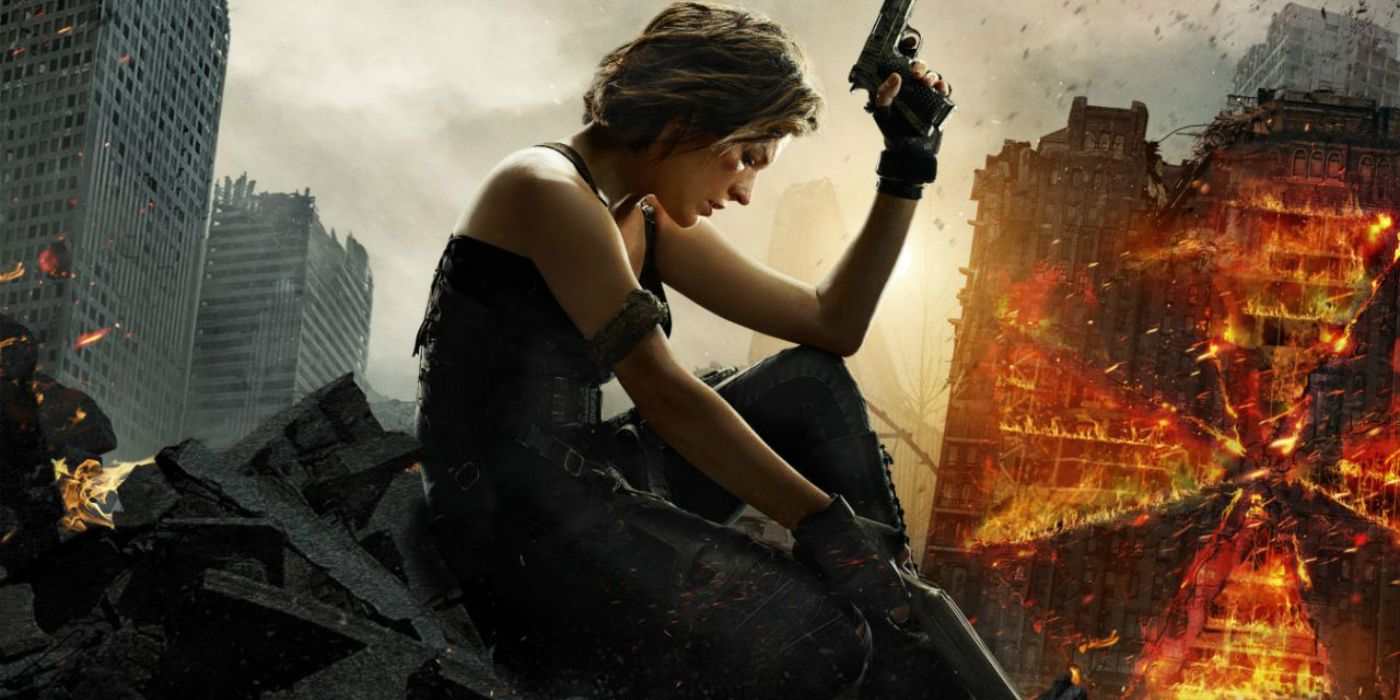 Alice sitting with her gun with the ruined city in the background in Resident Evil The Final Chapter.