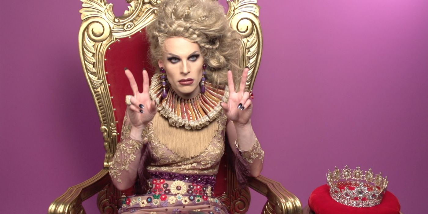 Katya poses sitting on a throne in a RuPaul's Drag Race All Stars season 2 promo image
