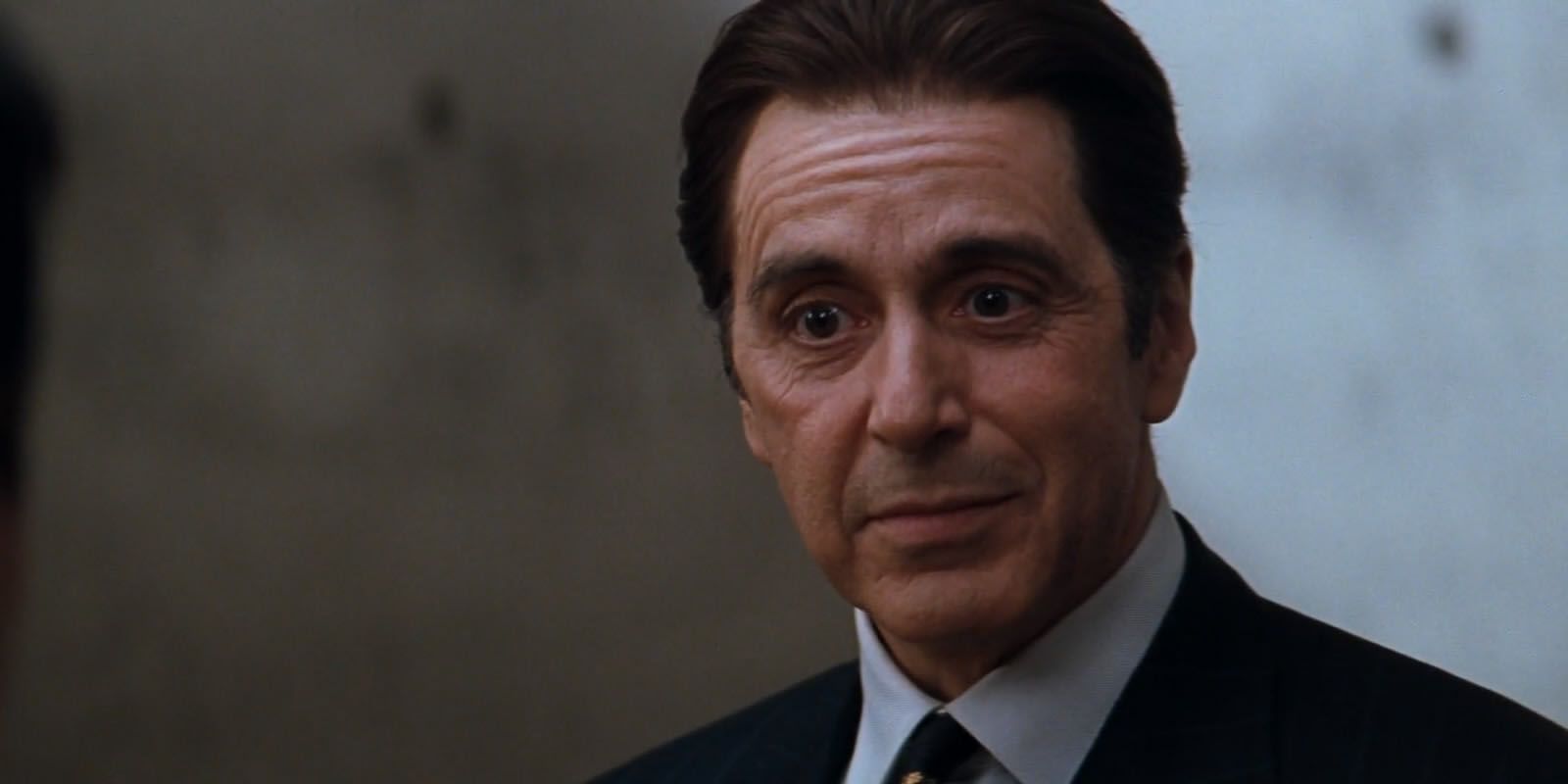 Al Pacino smiling in The Devil's Advocate