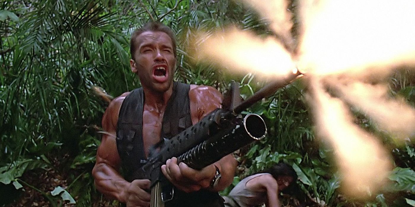 Arnold Schwarzenegger firing a machine gun in Predator 1987