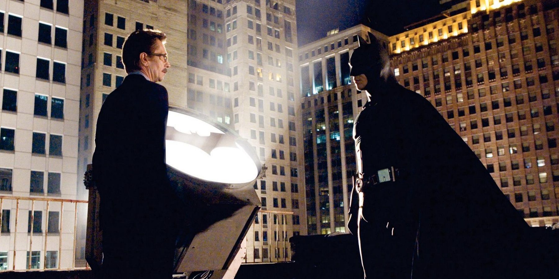 Gary Oldman and Christian Bale in the Batman Begins ending scene