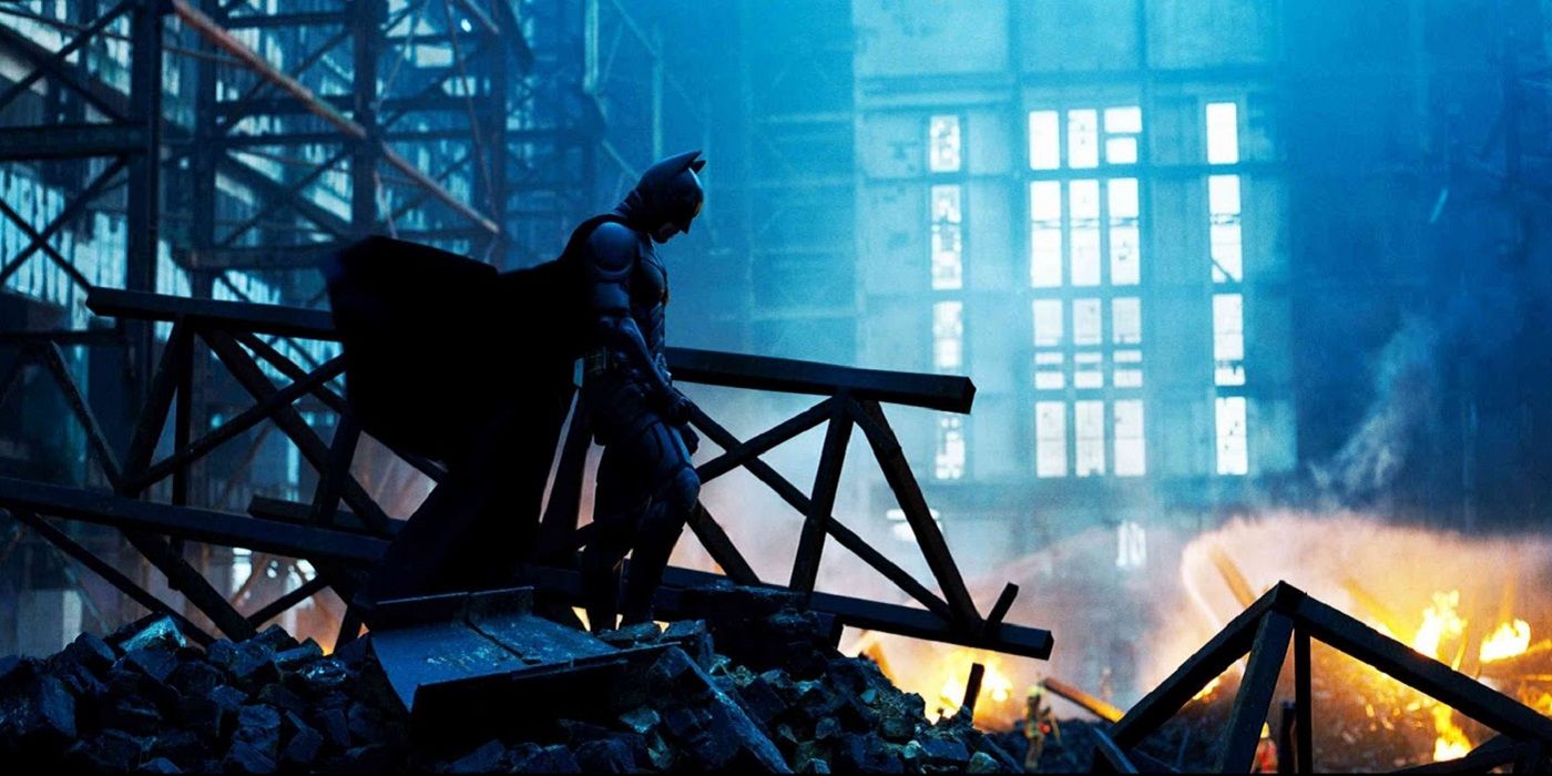 Batman standing in the wreckage in The Dark Knight