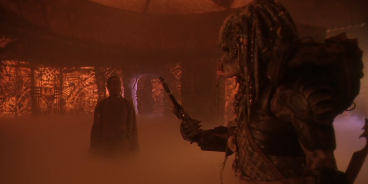 Danny Glover and a Predator in Predator 2.
