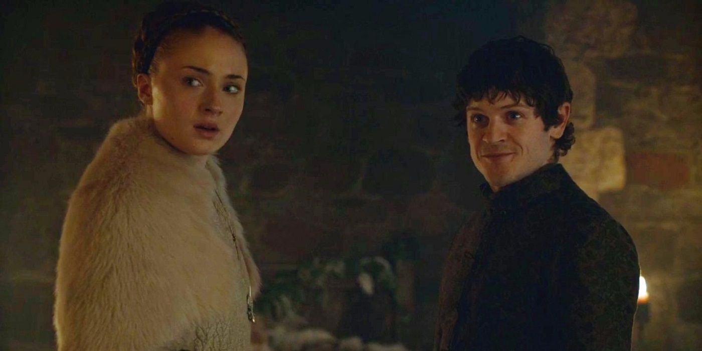 A shocked Sansa and a smiling Ramsay looking in the same direction in Game of Thrones.
