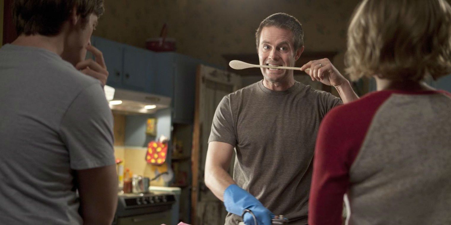 Garrett Dillahunt with a ladle in his mouth in Raising Hope