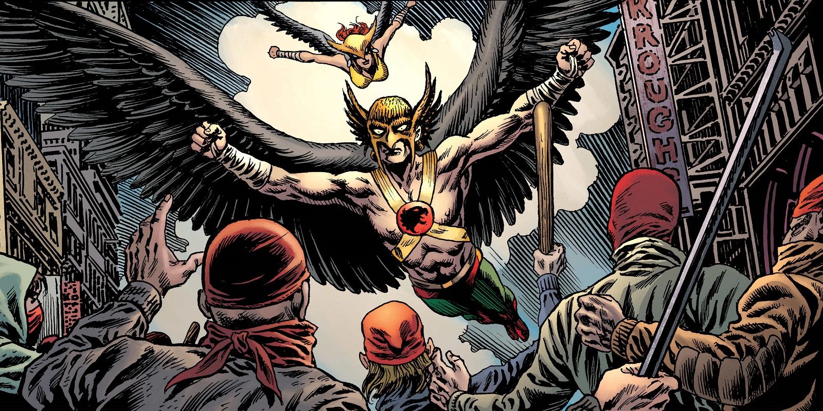 Hawkman and Hawkgirl flying over a city