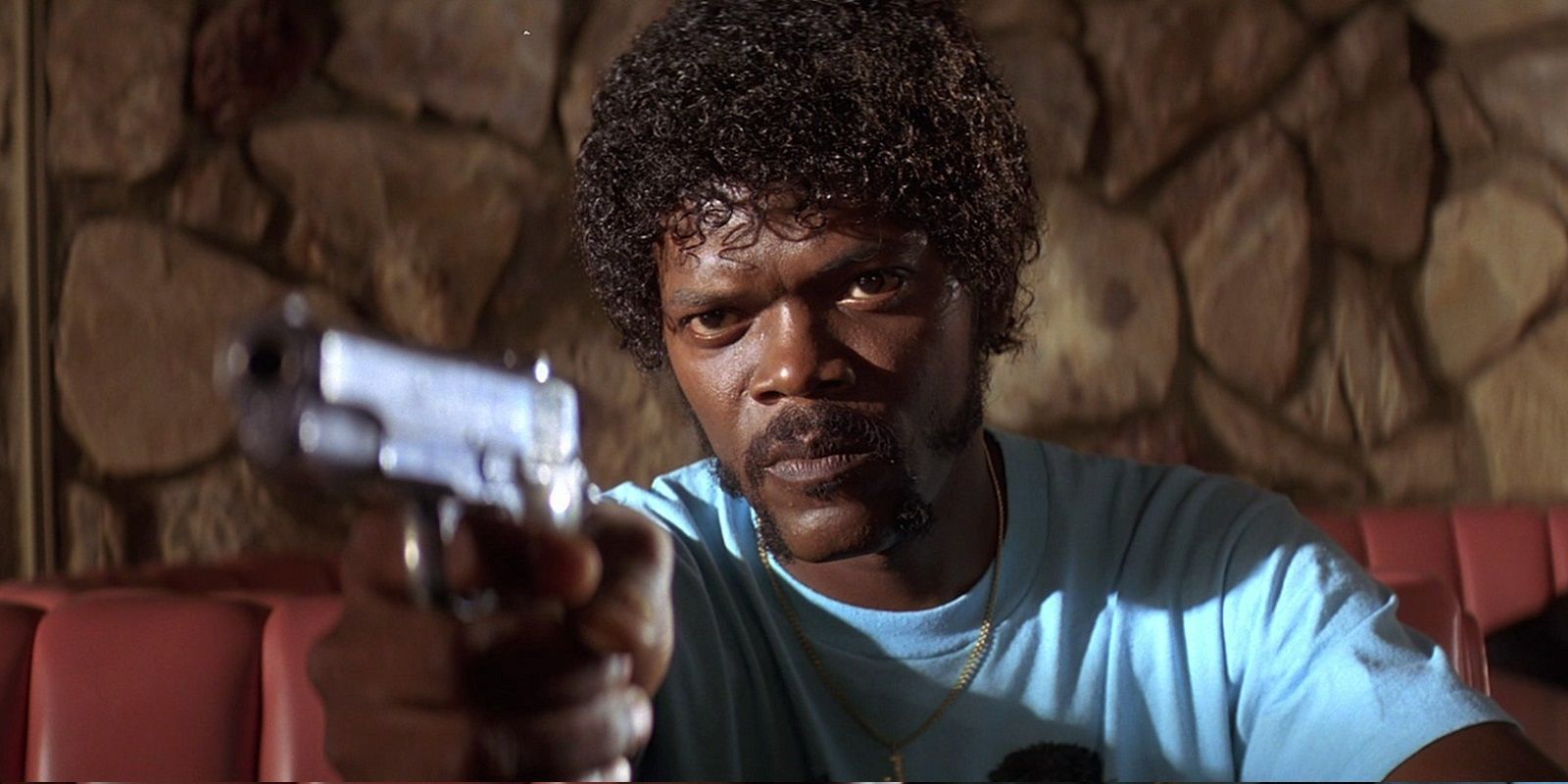 Samuel Jackson pointing a gun in the cafe in Pulp Fiction 