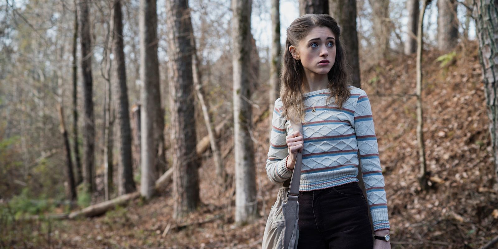 Nancy at the woods in Stranger Things.