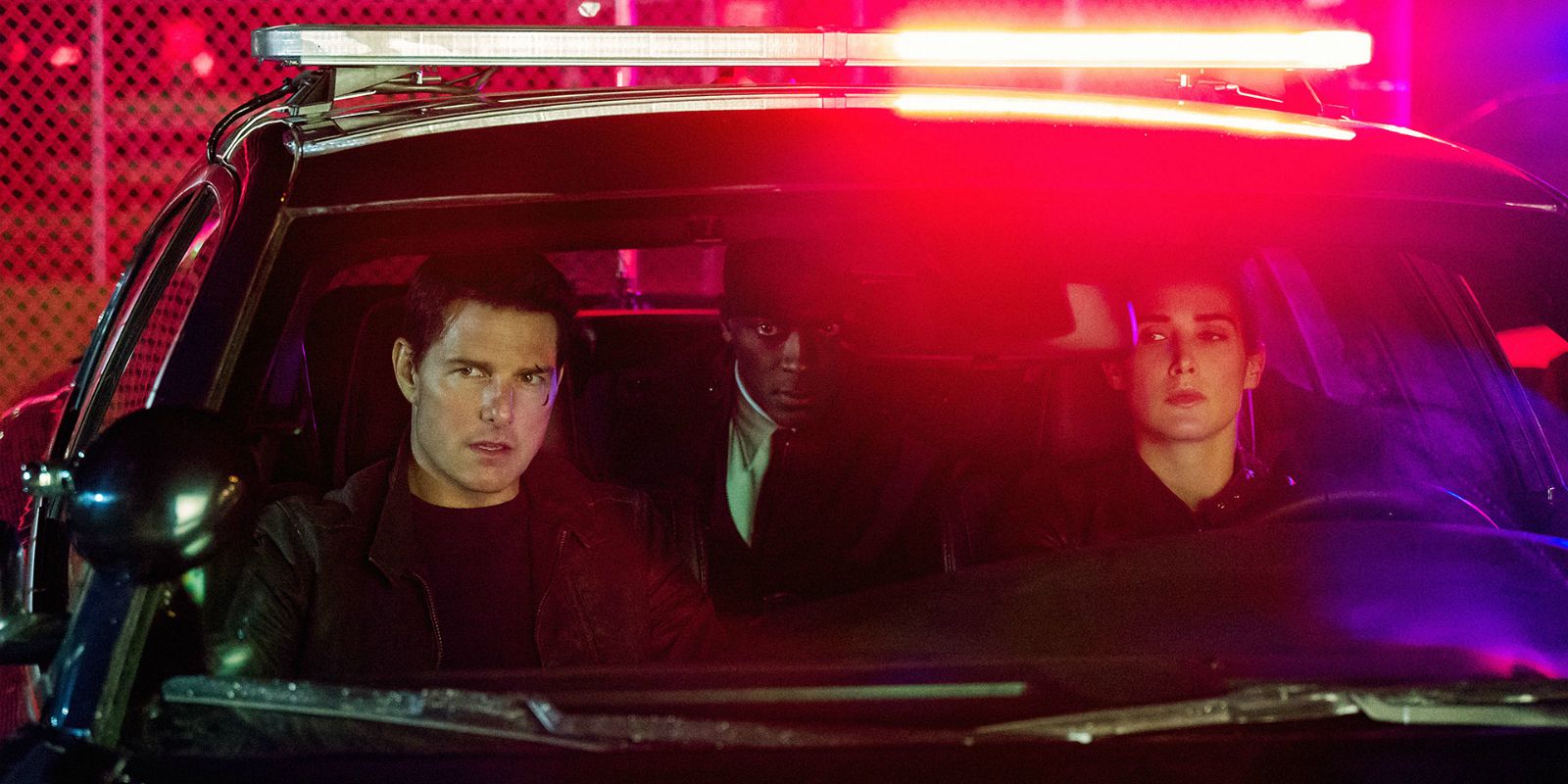 Tom Cruise as Jack Reacher, Aldis Hodge as Espin, and Cobie Smulders as Major Turner in Jack Reacher: Never Go Back