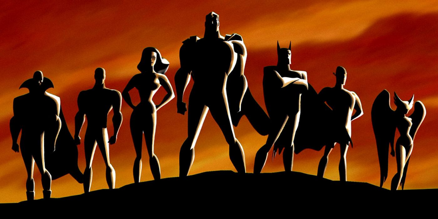 The animated Justice League, in silhouette, standing on a cliff.