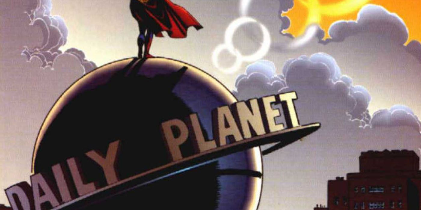 Superman standing on top of the Daily Planet globe