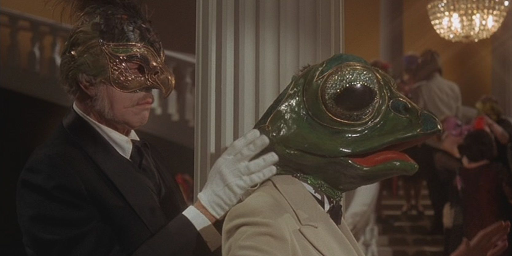 The Abominable Dr Phibes Vincent Price at a Masquerade with a man in a frog mask