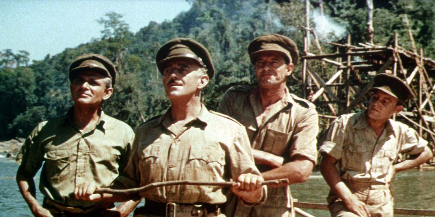 Main cast of the Bridge Over The River Kwai looking into the distance.