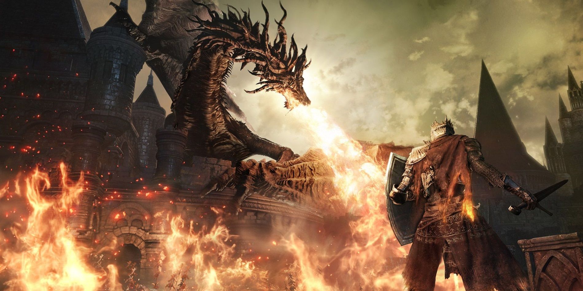 A dragon breathing fire on houses in Dark Souls III