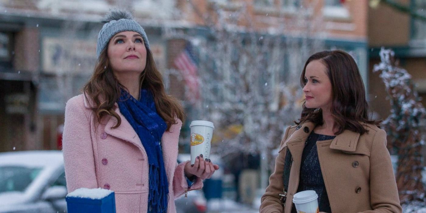 Lorelai and Rory holding coffee in the snow in Gilmore Girls: A Year in the Life