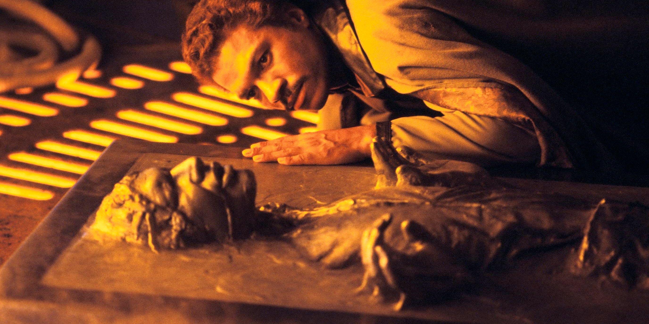 Lando Calrissian checking hjat Han Solo is alive after he is frozen in carbonite in Star Wars The Empire Strikes Back