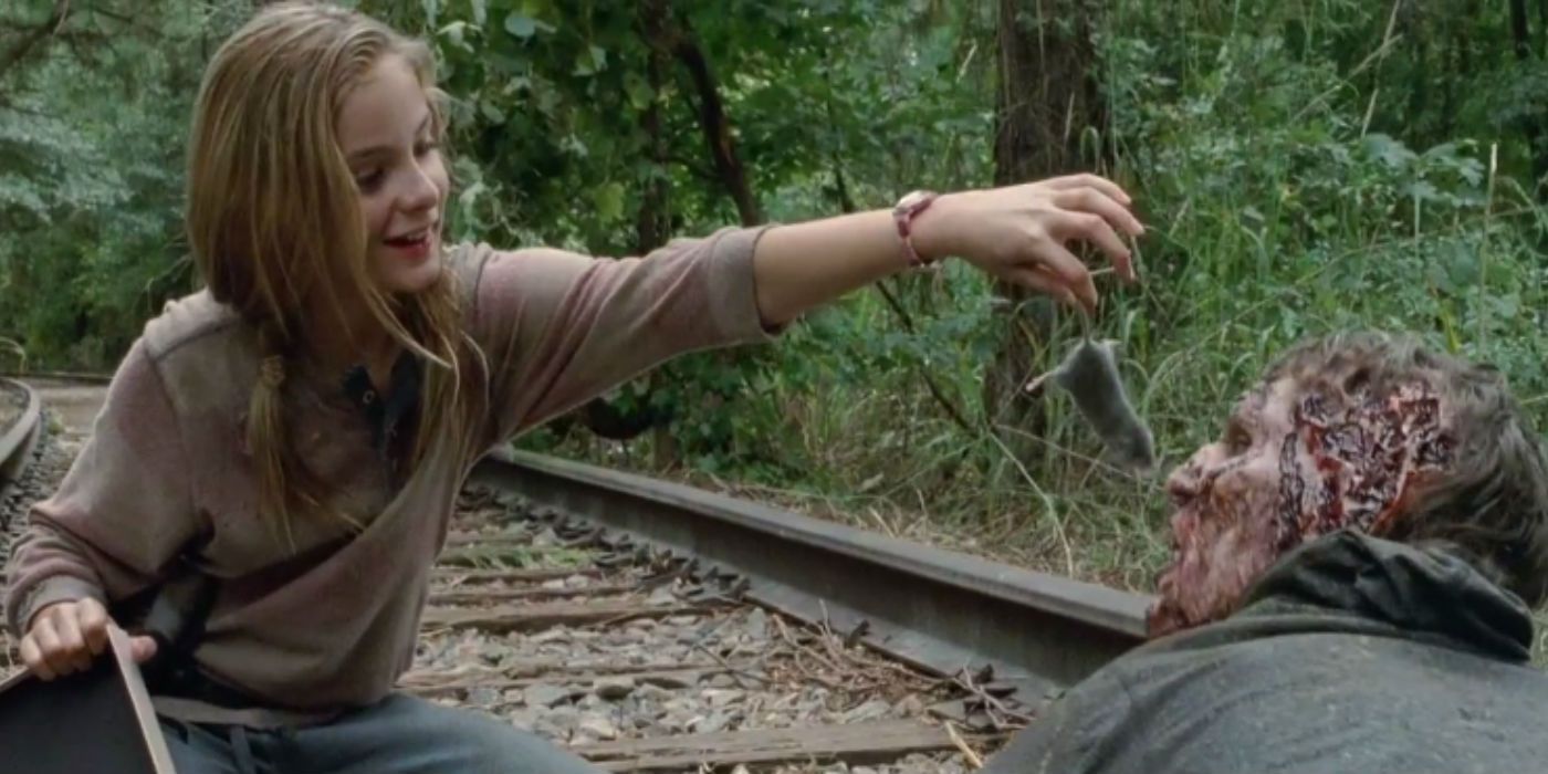 Lizzie feeds a walker on The Walking Dead