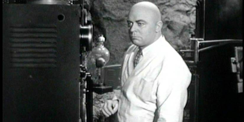 Lyle Talbot as Lex Luthor working in a lab in Atom Man vs. Superman