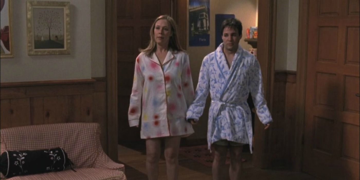 Paris and Doyle wearing their robes in Gilmore Girls