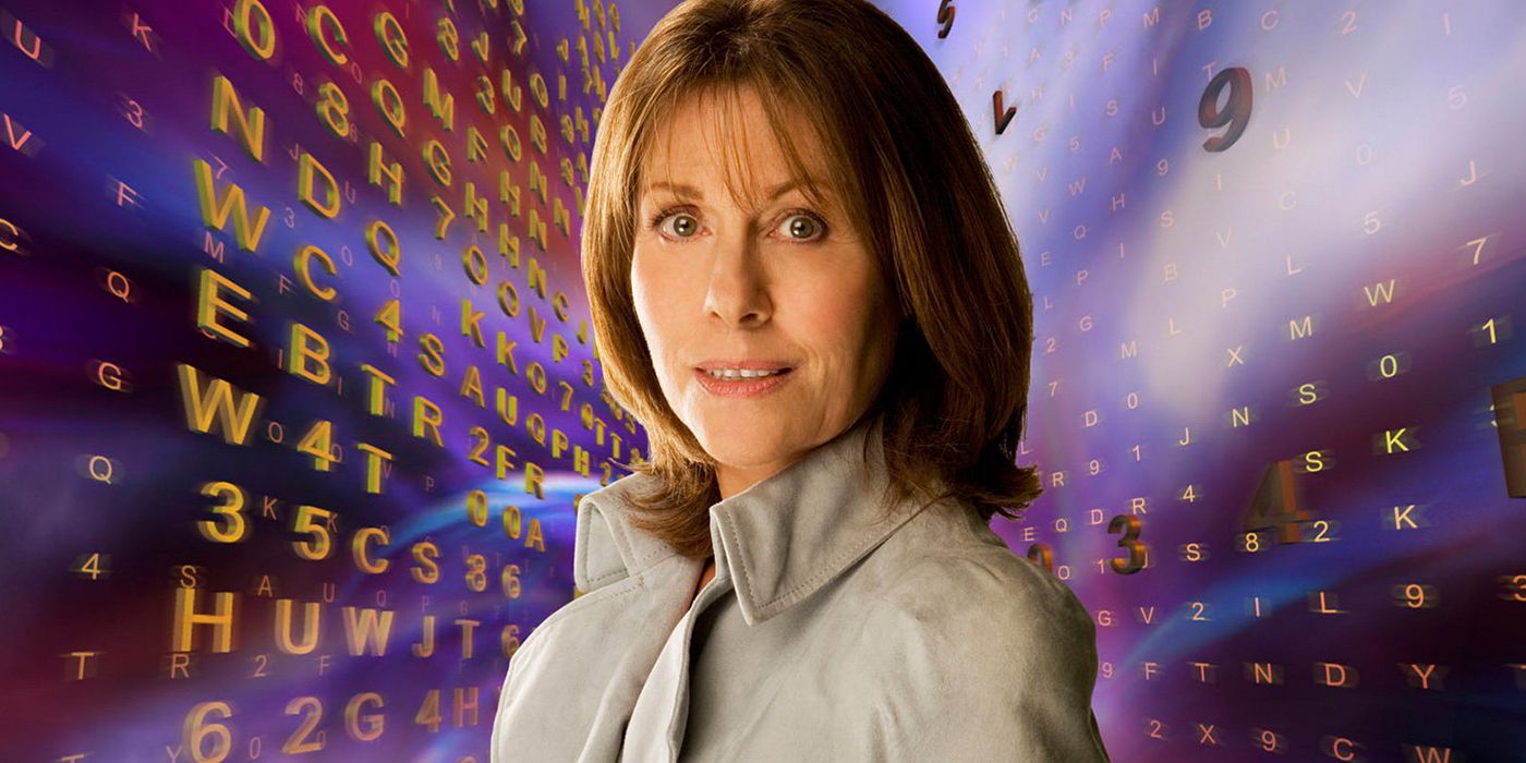 Sarah Jane Smith standing in front of several letters in Doctor Who
