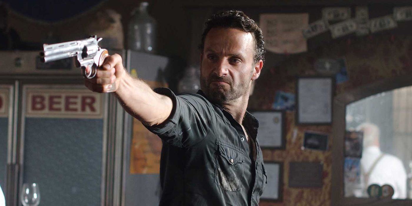 Rick Grimes pointing his gun in Walking Dead